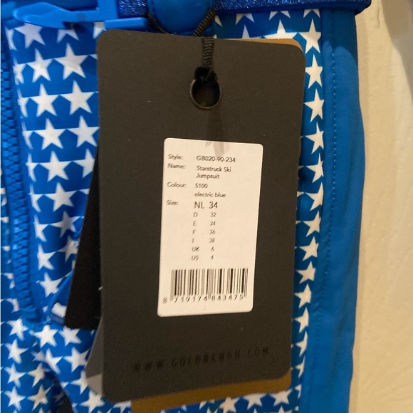 Women’s ski one piece. Never worn, size US 4, blue with white stars. Goldbergh - Picture 2 of 3